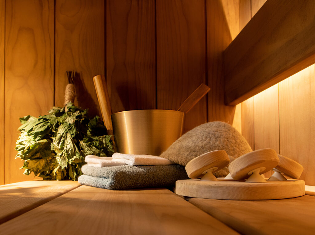 sauna accessories in the sauna wooden interior. Modern steam room